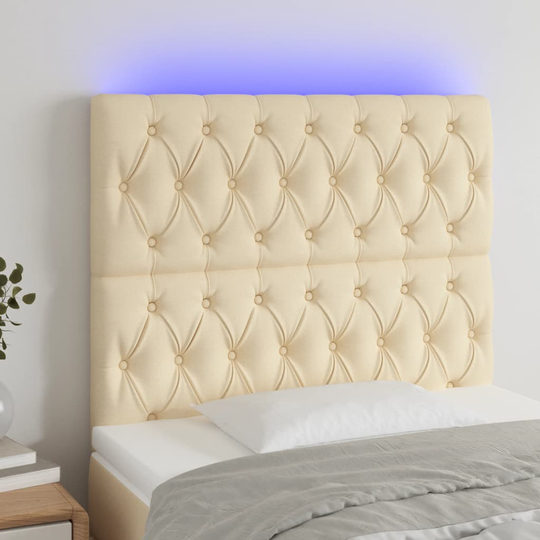 vidaXL Sänggavel LED gräddvit 100x7x118/128 cm tyg