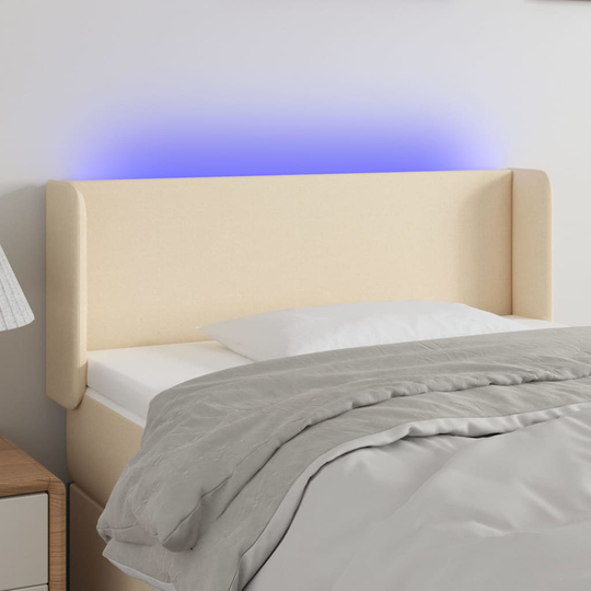vidaXL Huvudgavel LED gräddvit 83x16x78/88 cm tyg