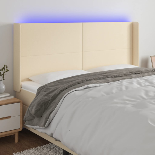 vidaXL Huvudgavel LED gräddvit 203x16x118/128 cm tyg
