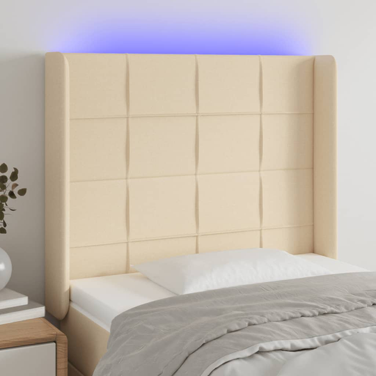 vidaXL Huvudgavel LED gräddvit 83x16x118/128 cm tyg